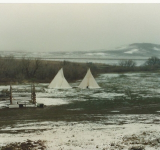teepees at camp azure from a distance