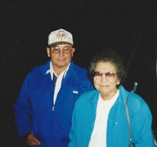 Joe W. Azure standing with Dorothy Gopher