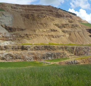 View of a full side shot of the mine damage to the mountain
