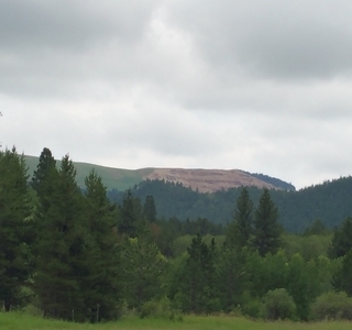 View in the distance of the mined mountain top